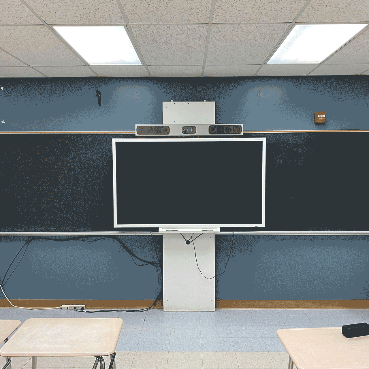 Think Board resurfacing with a smartboard in the middle
