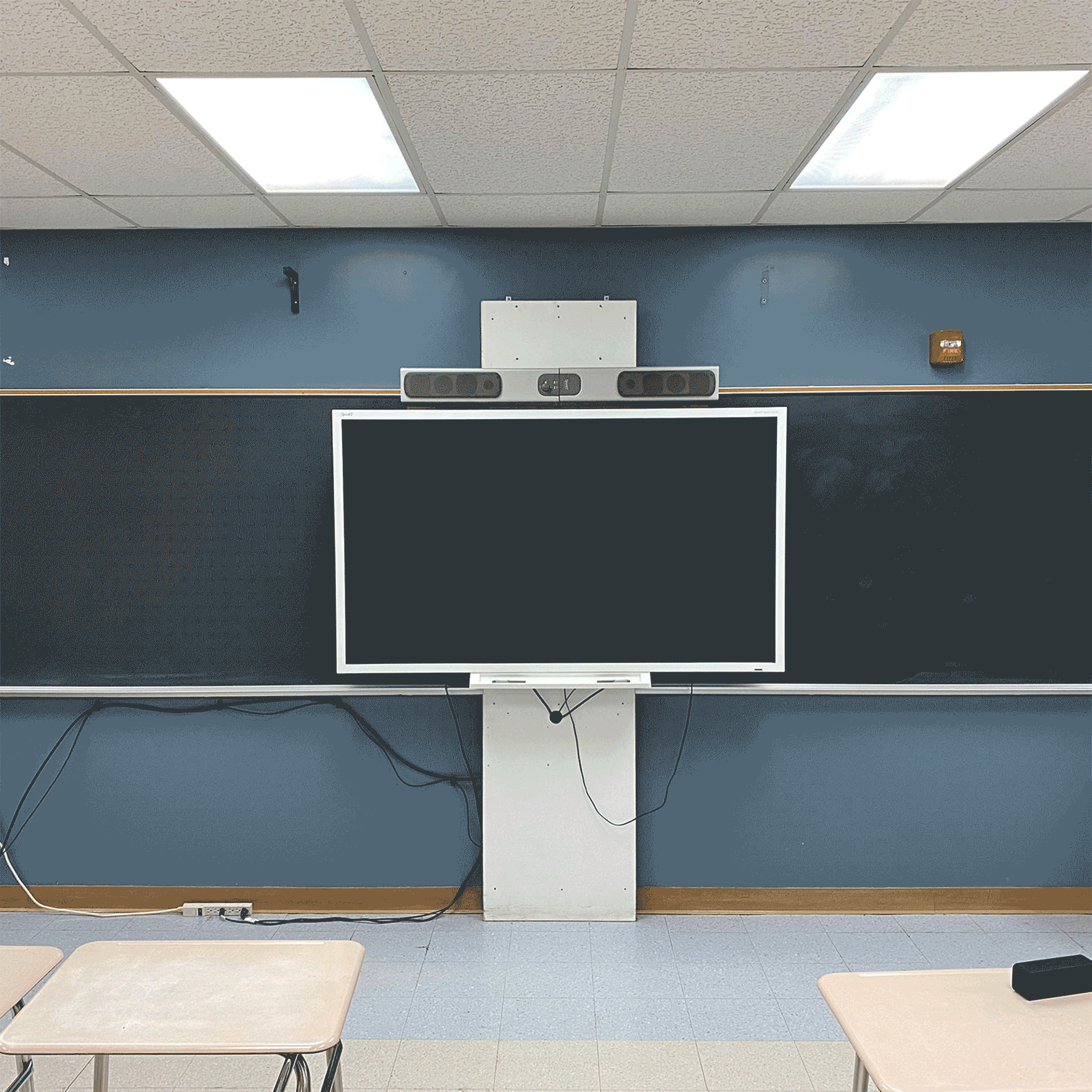 Think Board resurfacing with a smartboard in the middle