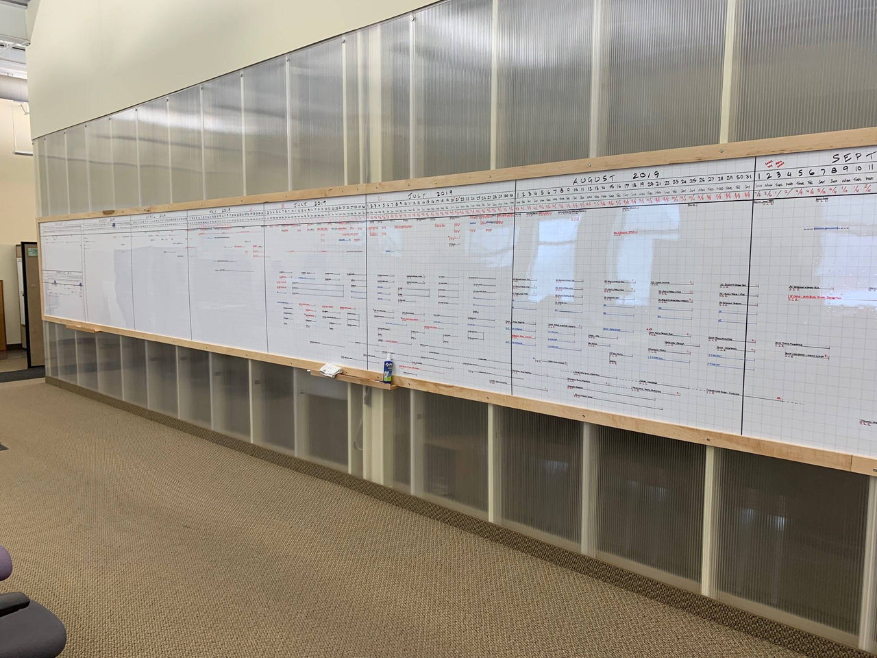 Wall to wall custom whiteboard installation