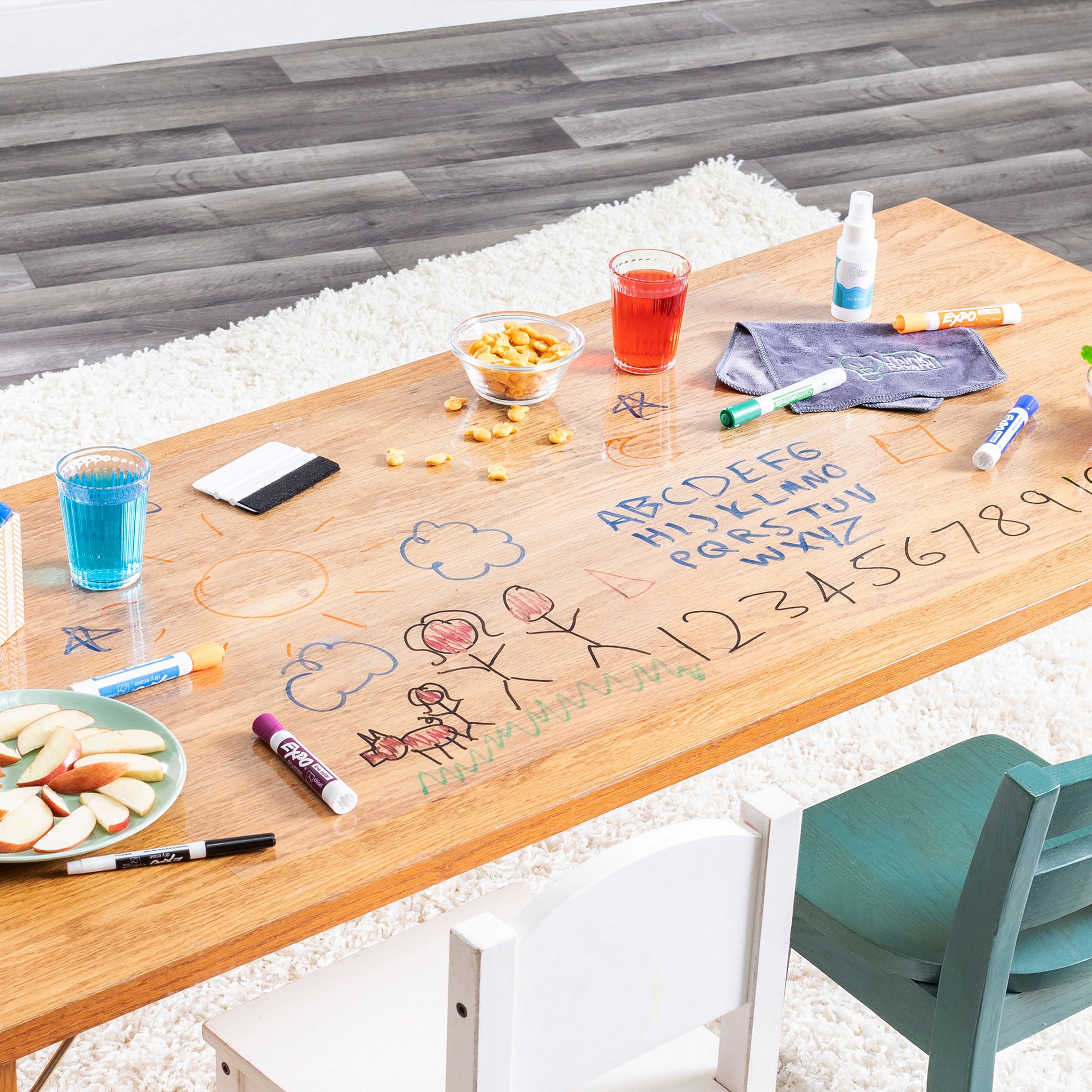 clear whiteboard covering on table